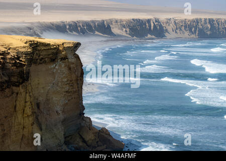 Red sand beach (Playa roja) in Paracas National Reserve in Southern Peru on the Paracas Peninsula Stock Photo