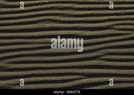 Smooth Flowing Ripple Pattern In Soft Beach Sand Stock Photo