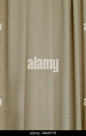 dense textile curtain background or texture with folds. Stock Photo