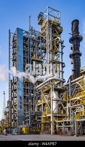 Refinery with steam and pipe racks Stock Photo