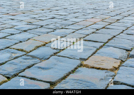 Stone pavement texture. Granite cobblestoned pavement background. Abstract background of old cobblestone pavement close-up. Seamless texture. Perfect Stock Photo
