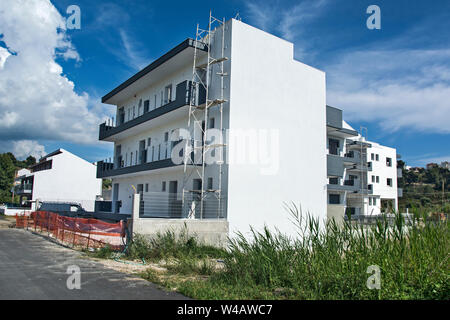 Modern hotel and residential building under construction intended for tourists. Stock Photo