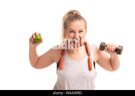 Overweight blond woman struggling with extra weight Stock Photo