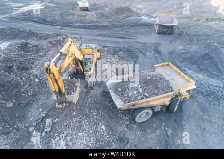 Excavator Loading Coal Truck from Aerial View Stock Photo - Alamy