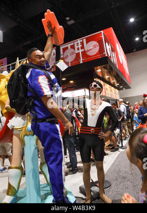 San Diego, California, USA. 20th July, 2019. San Diego, California, U.S. - Cosplay fan poses with fan at the San Diego Convention Center Credit: Alexander Seyum/ZUMA Wire/Alamy Live News Stock Photo