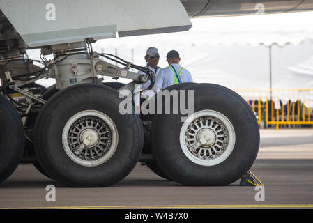 Singapore - February 4, 2018: Main landing gear of Airbus A350-1000 XWB in Airbus factory livery during Singapore Airshow at Changi Exhibition Centre Stock Photo