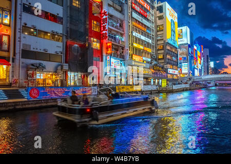 Osaka, Japan - October 28 2018: Dotonbori is one of the most popular tourist destination runs alongside Dotonbori canal between Dotonboribashi and Nip Stock Photo