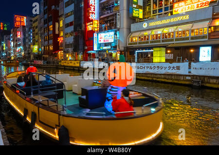 Osaka, Japan - October 28 2018: Dotonbori is one of the most popular tourist destination runs alongside Dotonbori canal between Dotonboribashi and Nip Stock Photo