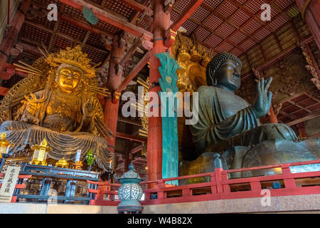 Nara, Japan - October 29 2018: Daibutsu - the great Buddha with Kokuzo Bosatsu - Chinese Goddess in Daibutsuden, the great Buddha hall at Todaiji temp Stock Photo