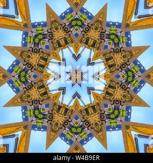 Tractor arm made into a decorative design. Geometric kaleidoscope pattern on mirrored axis of symmetry reflection. Colorful shapes as a wallpaper for Stock Photo