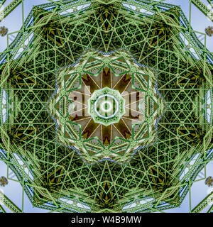Very busy patterned photo created from the shapes of a green bridge in California. Geometric kaleidoscope pattern on mirrored axis of symmetry reflect Stock Photo