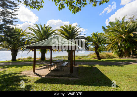 Picnic area by Lake McDonald in Noosa Botanic Gardens, Hinterland, Sunshine Coast, Queensland, QLD, Australia Stock Photo