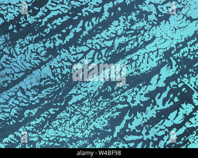 Decorative navy blue and black cracked peeling plaster in vintage style. Texture of turquoise stone background, wall closeup. Stock Photo