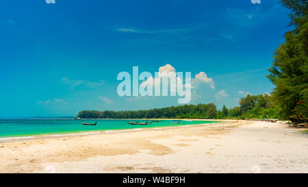 Nature landscape tropical beach Phuket with traditional wooden boat and beautiful sand beach