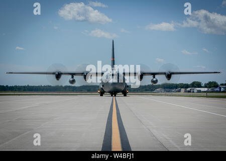 A U.S. Air Force C-130H3 Hercules from the Illinois Air National Guard’s 182nd Airlift Wing arrives at the Alpena Combat Readiness Training Center, Alpena, Mich., July 21, 2019 for Exercise Northern Strike 19. Northern Strike 19 is a National Guard Bureau-sponsored exercise uniting service members from more than 20 states, multiple service branches and numerous coalition countries during the last two weeks of July 2019 at the Camp Grayling Joint Maneuver Training Center and the Alpena Combat Readiness Training Center, both located in northern Michigan and operated by the Michigan National Guar Stock Photo