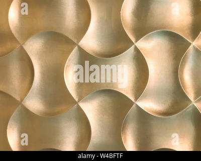 Golden 3D interior decorative wall panel with unusual geometric shape. Metallic yellow background with pattern. Abstract texture. Stock Photo