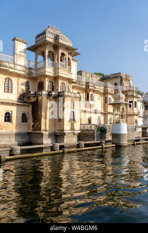 Detail of architecture, decorated facade near water lake in Udaipur, Rajasthan, India. Close up Stock Photo