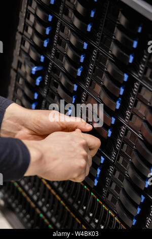 IT Consultant Installing Server Drive In San Stock Photo