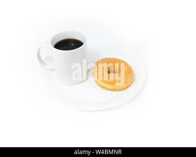 coffee in White mug and donuts on a white plate on the white background Stock Photo