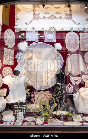 Traditional and famous Belgian lace in a shop window, Brussels, Belgium Stock Photo