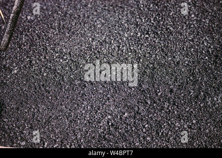 Asphalt texture background, Laying new asphalt on the city road. Stock Photo