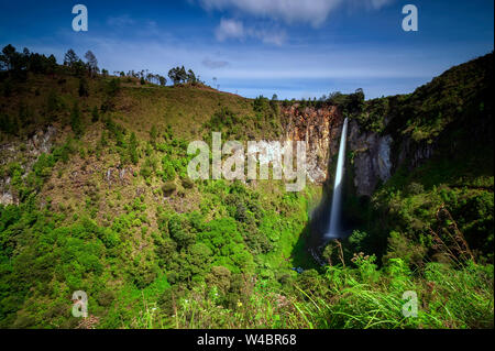 SIPISO-PISO WATERFALL LANDSCAPE WITH BLUE SKY. Stock Photo