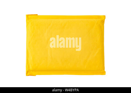 yellow postal bag for packing parcels. Isolated on white background. space for text Stock Photo