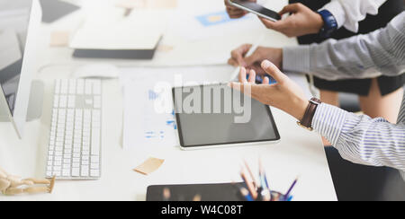 UI UX website development team sketching wireframe layout for responsive web content in studio Stock Photo