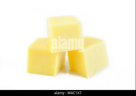 cheese cubes isolated on white background Stock Photo