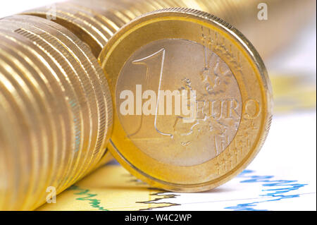 detail of Euro coin on financial chart Stock Photo