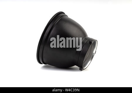 Reflector with honeycomb grid accessory for studio strobes and flashes on white background. Selective focus Stock Photo