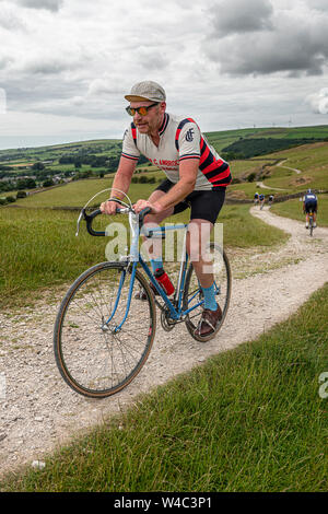 cyclist on road bike climbing the hill on a sunny day Stock Photo - Alamy