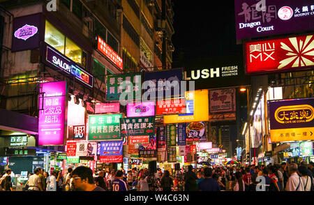 Kowloon, Hong Kong-Nov 6th, 2016: Lighted signboards and signs illuminated the streets of Kowloon. Hong Kong is famous for the myriad of neon lights a Stock Photo