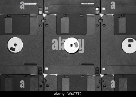 Background of bunch black floppy disks Stock Photo