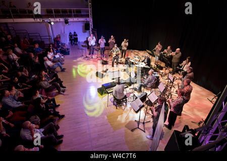 Leeds, UK. 21st July, 2019. The closing mainstage act of the Leeds Jazz Festival, The Electric Lady Big Band (Danny Ilet leader and arranger on guitar) perform their arrangement of Jimi Hendrix's Masterpiece album 'Electric Ladyland'. Credit: John Bentley/Alamy Live News Stock Photo