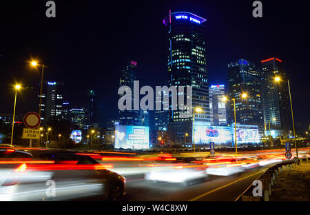 TEL AVIV - FEBRUARY 25, 2016:  Ayalon highway and Ramat Gan business center at night. Stock Photo