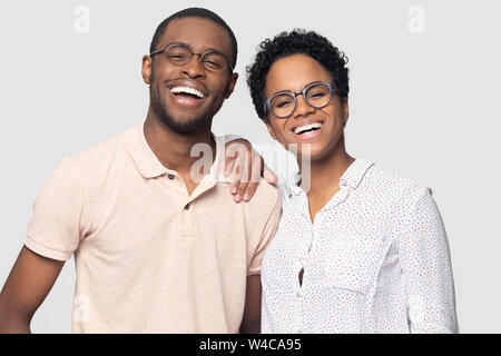 Portrait of smiling ethnic couple posing for picture together Stock Photo