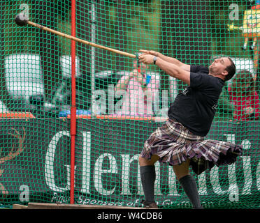 20 July 2019. Tomintoul Highland Games, Tomintoul, Moray, Scotland, UK. This is a scene from the 175th Games. Picture Content:- Kyle Randalls with the Stock Photo