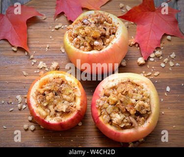 Baked apples stuffed with nut, honey and granola, top view Stock Photo