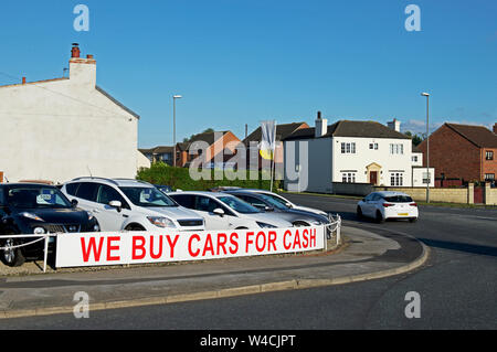 Sign We buy cars for cash at Hut Green Garage near Eggborough