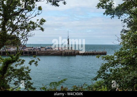 Verity. A stainless steel and bronze statue by Damien Hirst, on the pier entrance in the town of Ifracombe in Devon, England. Erected 2012. Stock Photo