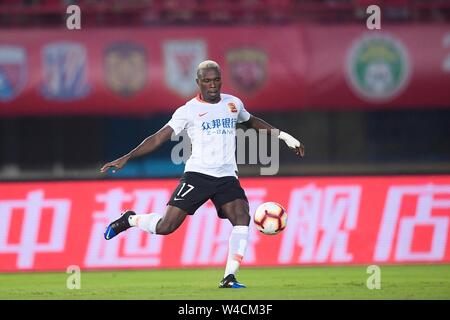 Ivorian football player Jean Evrard Kouassi of Wuhan Zall F.C. plays during the 19th round of Chinese Football Association Super League (CSL) against Henan Jianye in Zhengzhou, central China’s Henan province on 21 July 2019. The match ened with a draw 0-0. Stock Photo