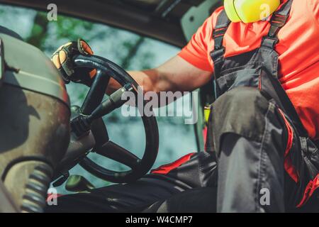 Industrial Job. Bulldozer Machine Operator. Caucasian Heavy Duty Machinery Driver. Stock Photo