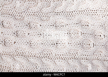 Woolen knitted white sweater texture close-up Stock Photo