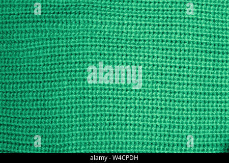 Woolen knitted texture of pastel green or mint color close-up Stock Photo