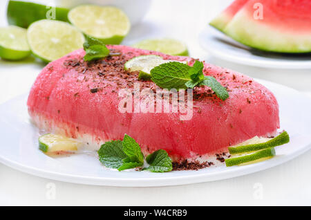Parfait ice cream sorbet from watermelon, whipped cream and chocolate Stock Photo