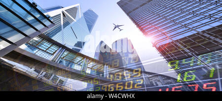 Stock Market Exchange on a skyscraper in Hong Kong background. Stock Photo