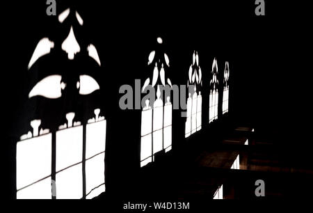 Shadows in Basel Minster, sunlight through the gothic windows, Swiss Stock Photo