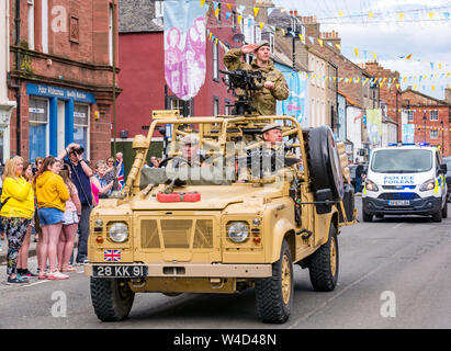 Lothian and Borders Yeomanry regiment parades through Dunbar High Street with a salute at Dunbar Town Hall, East Lothian, Scotland, UK Stock Photo