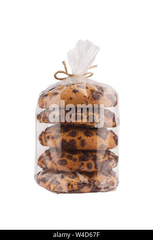 front view closeup of stack chocolate brown round cookies in transparent plastic packaging tied with rope isolated on white background Stock Photo